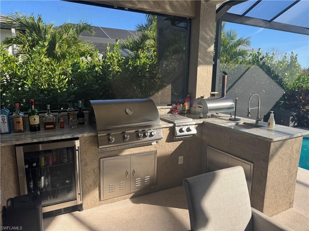 18445 Royal Hammock Boulevard Naples, FL 34114 - Photo 12 of 50 View of patio / terrace with exterior kitchen and wine cooler