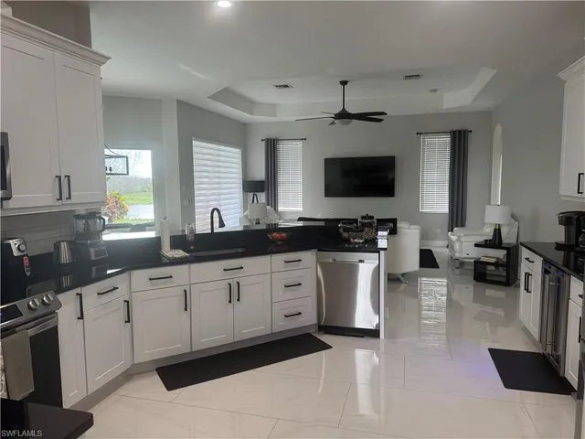 a bathroom with a sink toilet and mirror