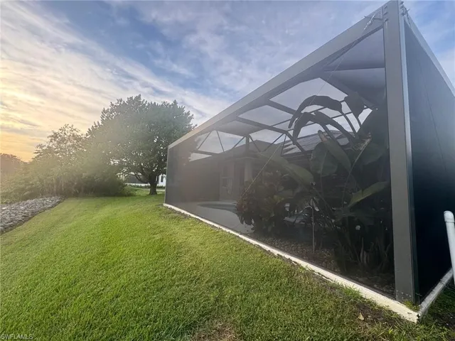 a view of swimming pool from a balcony