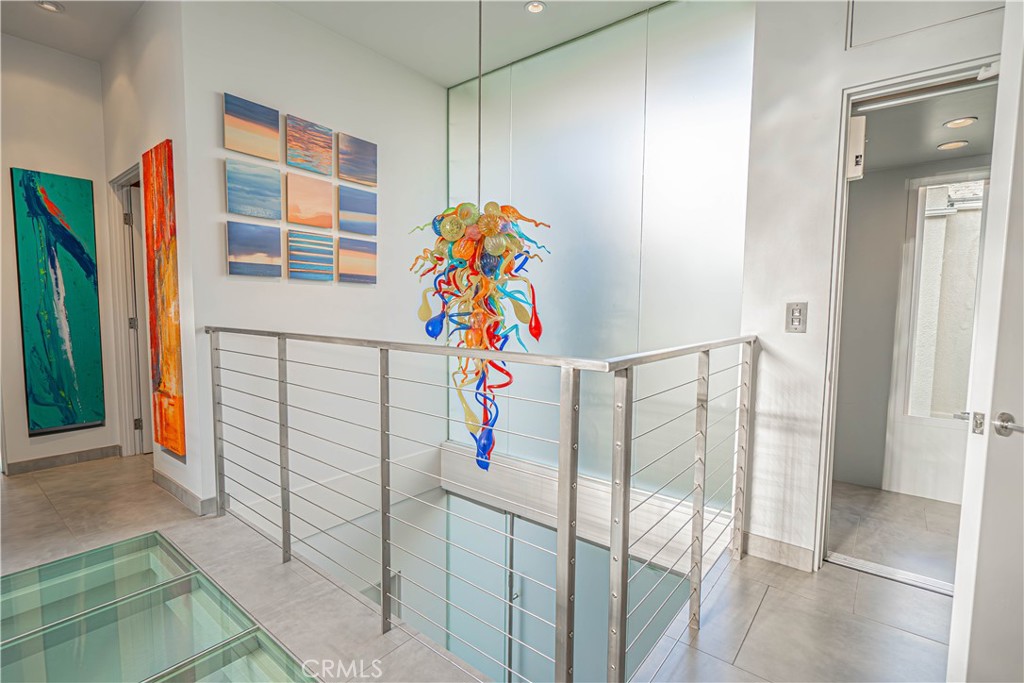 5220 Terramar Way Oxnard, CA 93035 - Photo 32 of 75 a view of a hallway with wooden floor and entryway