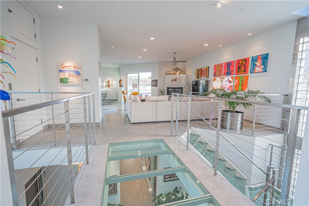 5220 Terramar Way Oxnard, CA 93035 - Photo 39 of 75 a living room with furniture and a flat screen tv
