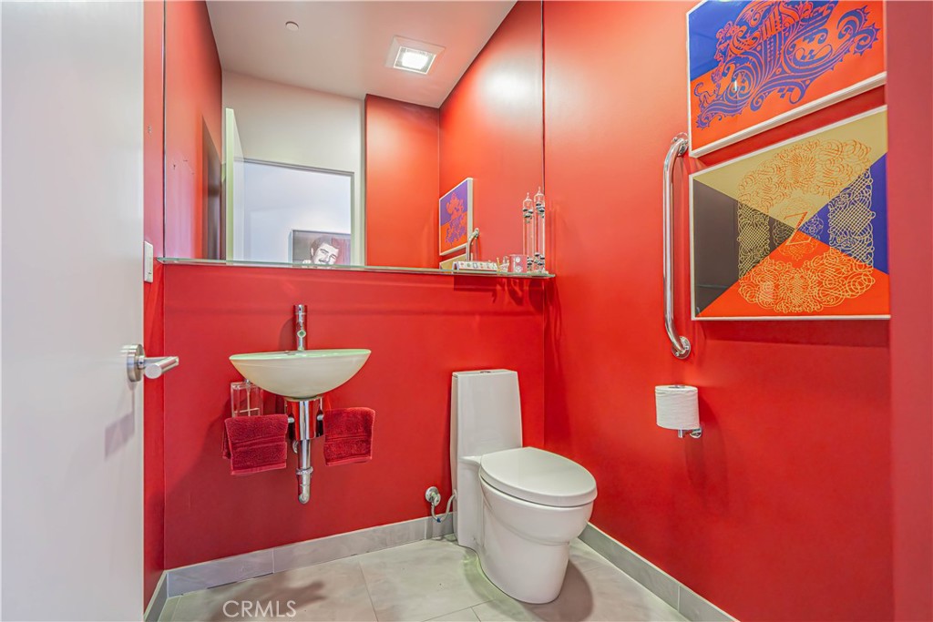 5220 Terramar Way Oxnard, CA 93035 - Photo 56 of 75 a bathroom with a sink and a mirror