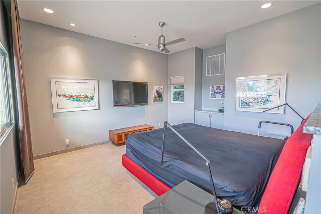 5220 Terramar Way Oxnard, CA 93035 - Photo 58 of 75 a living room with furniture and a flat screen tv