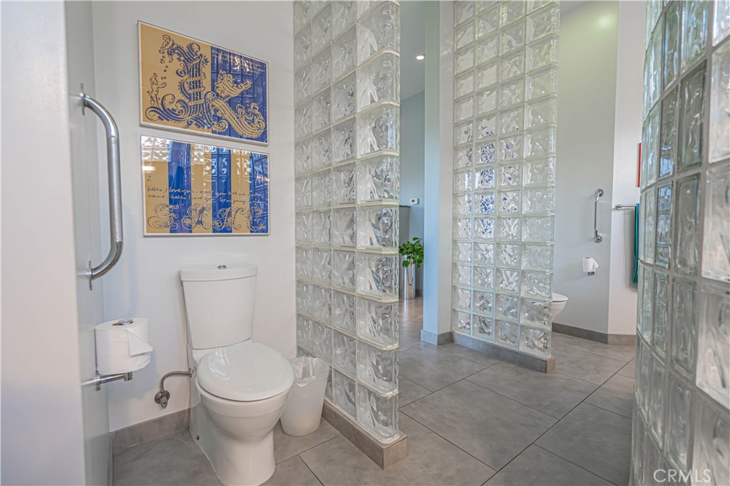 5220 Terramar Way Oxnard, CA 93035 - Photo 66 of 75 a white toilet sitting next to a bathroom sink