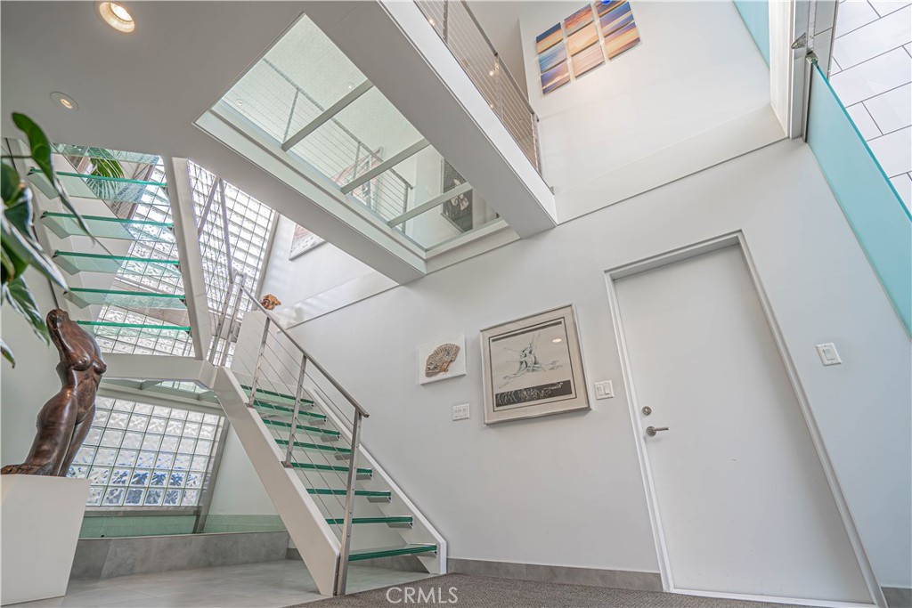 5220 Terramar Way Oxnard, CA 93035 - Photo 8 of 75 a view of entryway and hall with wooden floor