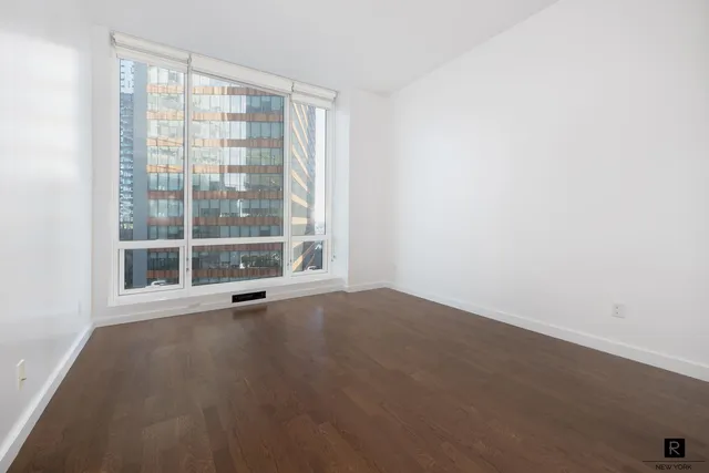 a kitchen with a refrigerator sink and stove