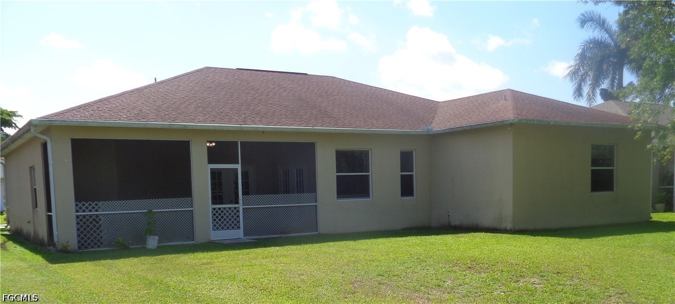 2463 Nature Pointe Loop Fort Myers, FL 33905 - Photo 43 of 50 a view of front of a house with yard