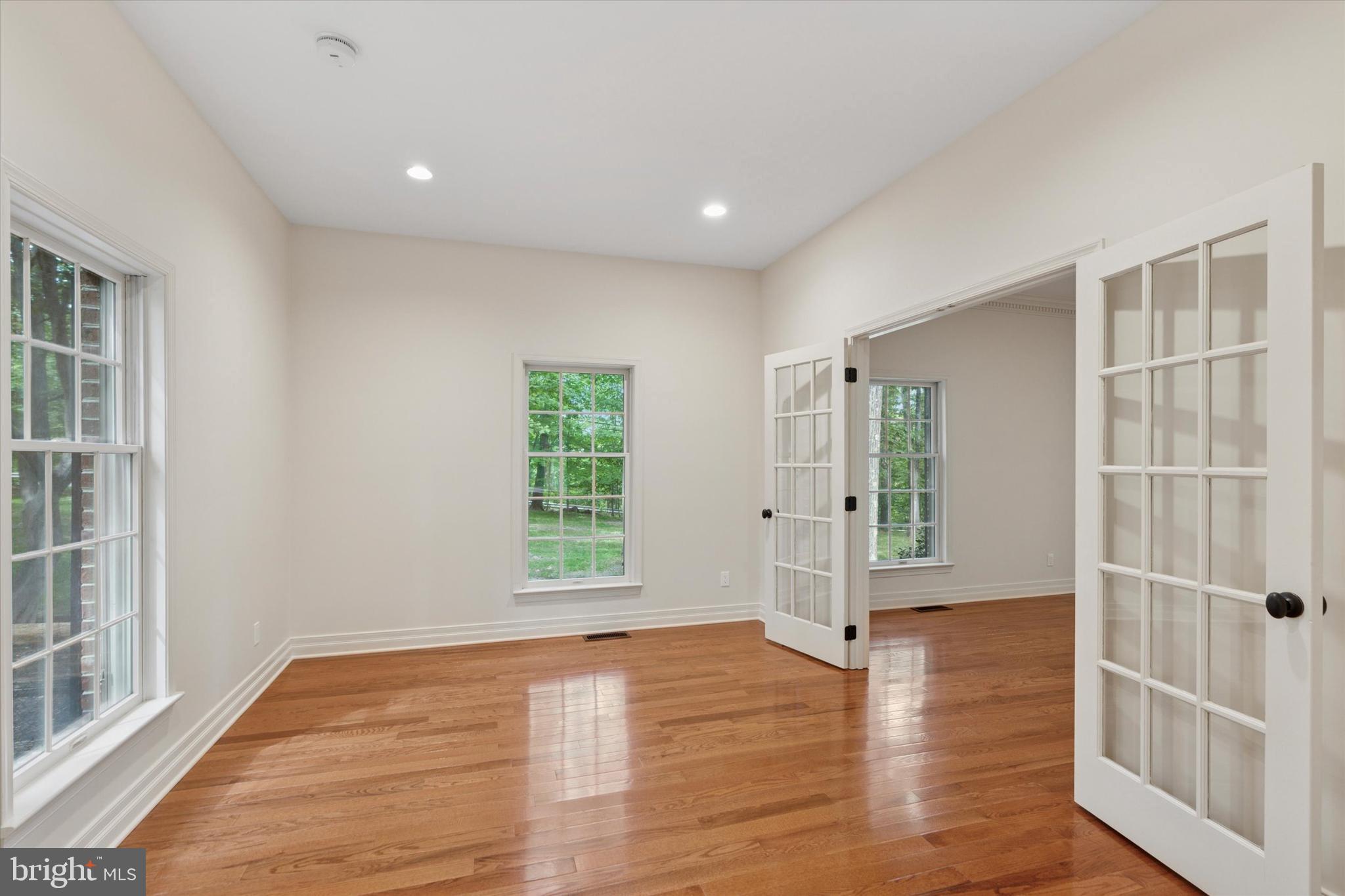 2824 Hill Road Green Lane, PA 18054 - Photo 11 of 40 a view of empty room with wooden floor and fan