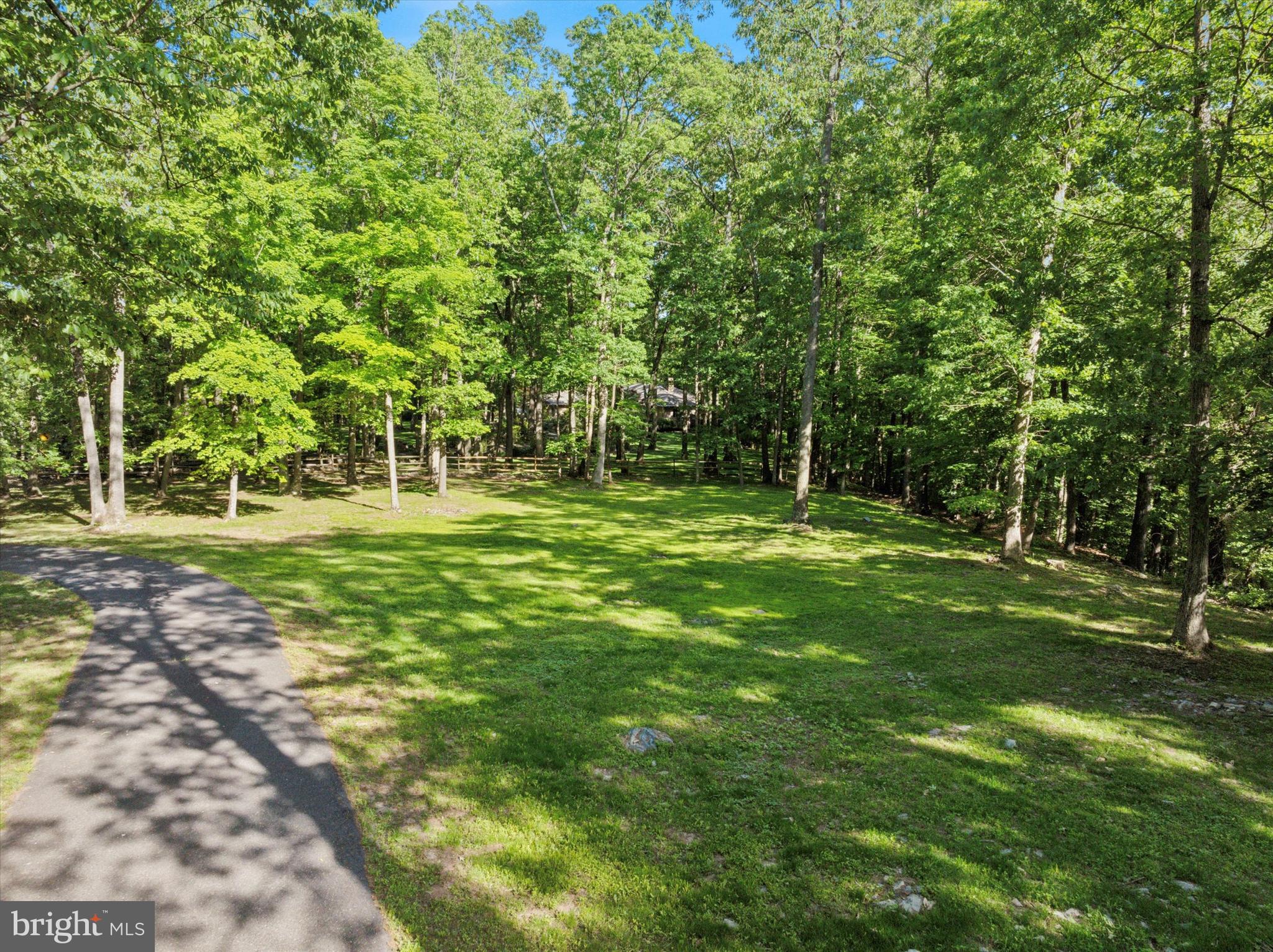 2824 Hill Road Green Lane, PA 18054 - Photo 29 of 40 a grassy field with trees in the background