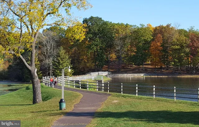 a view of lake with green space