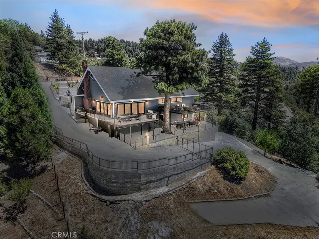 a kitchen with stainless steel appliances granite countertop a sink and a counter top space