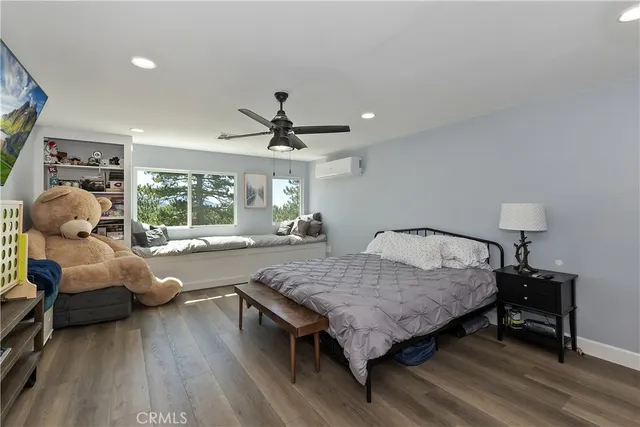 a bathroom with a sink a mirror and a shower