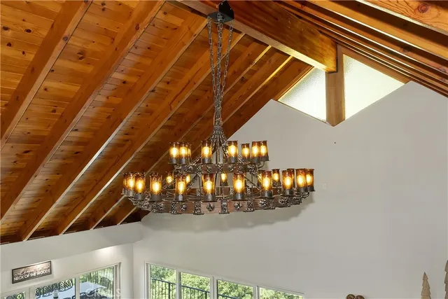 a view of a chairs and table on the deck