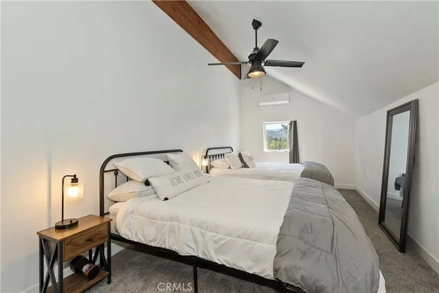 a view of a city with a tree in the background