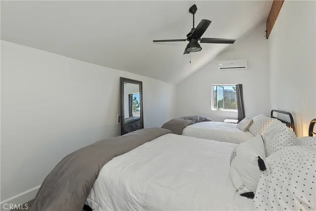 a view of a city with lush green forest