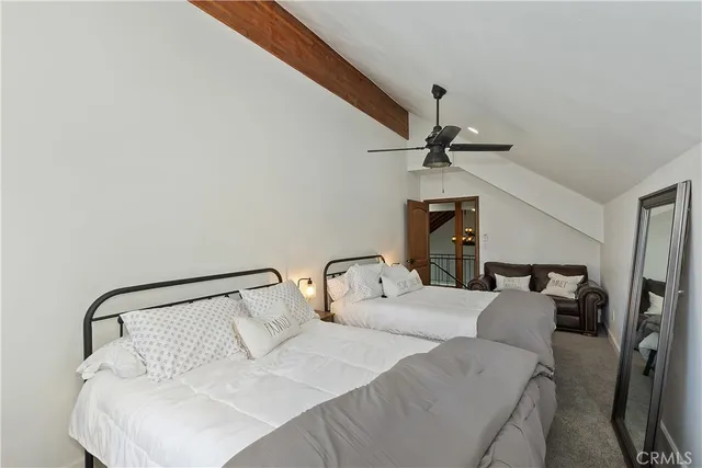 a terrace with outdoor seating and city view