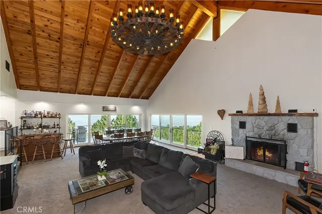 a view of two chairs in the balcony