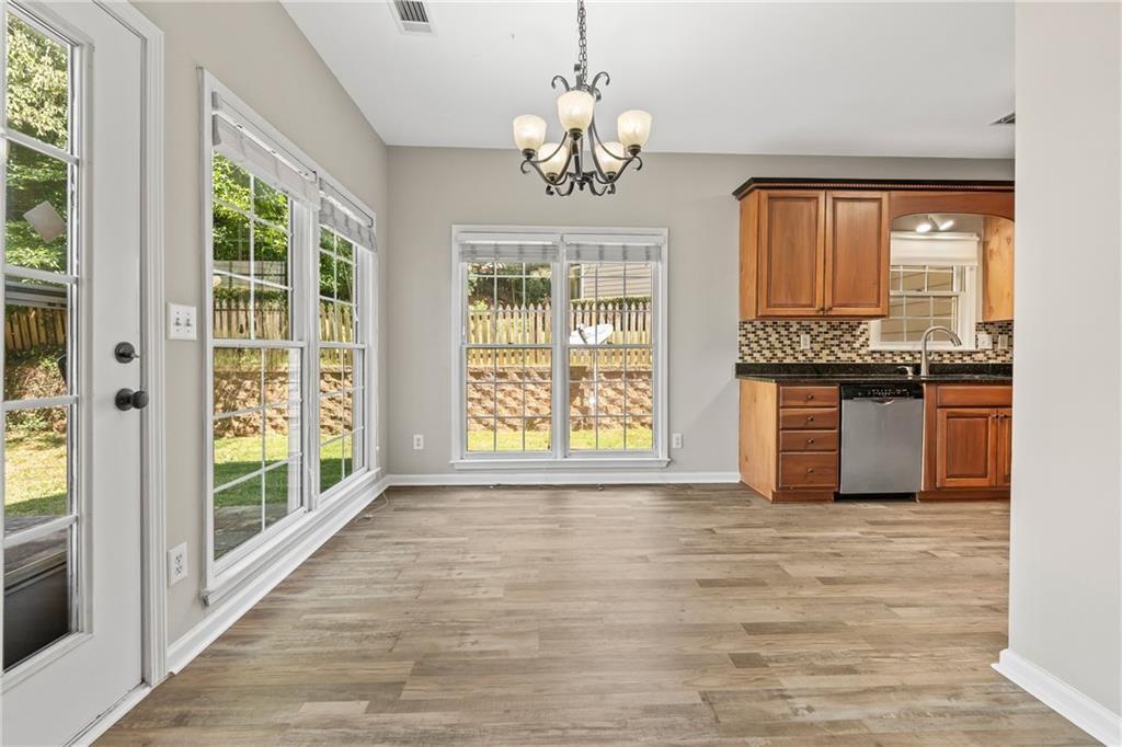 2878 Calhoun Square Suwanee, GA 30024 - Photo 15 of 42 a view of an empty room with a window