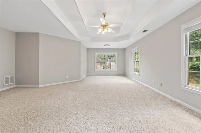 a view of a hallway with a window