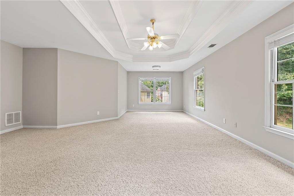2878 Calhoun Square Suwanee, GA 30024 - Photo 24 of 42 a view of an empty room with a window