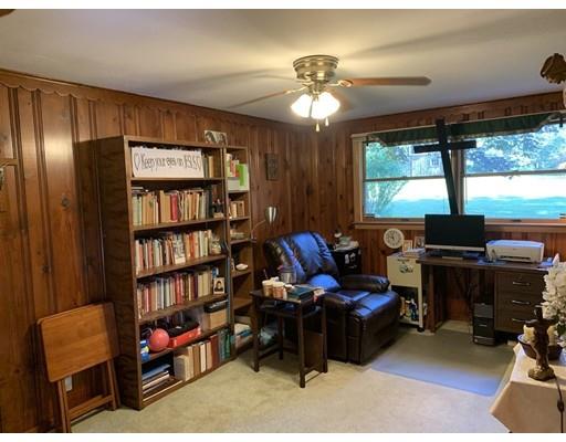 557 Southbridge Road Warren, MA 01585 - Photo 14 of 30 a living room with furniture and a flat screen tv