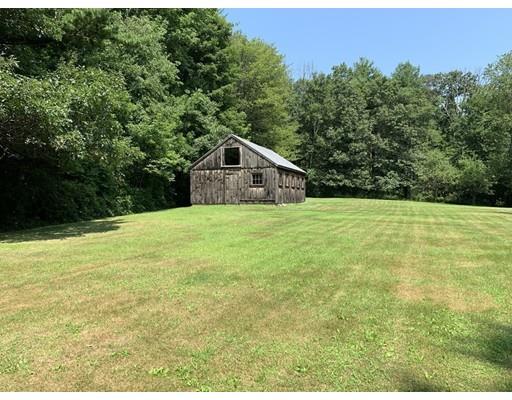 557 Southbridge Road Warren, MA 01585 - Photo 17 of 30 a view of a house with a yard