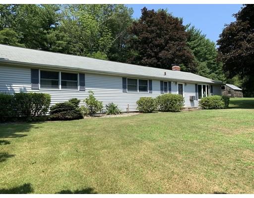 557 Southbridge Road Warren, MA 01585 - Photo 2 of 30 a front view of a house with garden