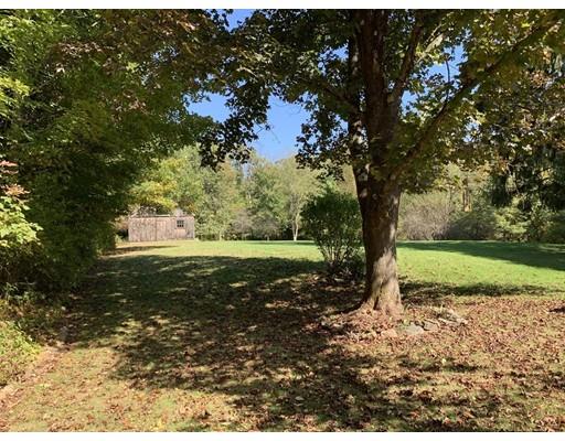 557 Southbridge Road Warren, MA 01585 - Photo 22 of 30 a view of a yard with trees