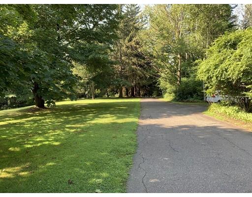 557 Southbridge Road Warren, MA 01585 - Photo 29 of 30 a view of green field with trees in the background