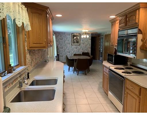 557 Southbridge Road Warren, MA 01585 - Photo 6 of 30 a kitchen with a sink and a stove top oven
