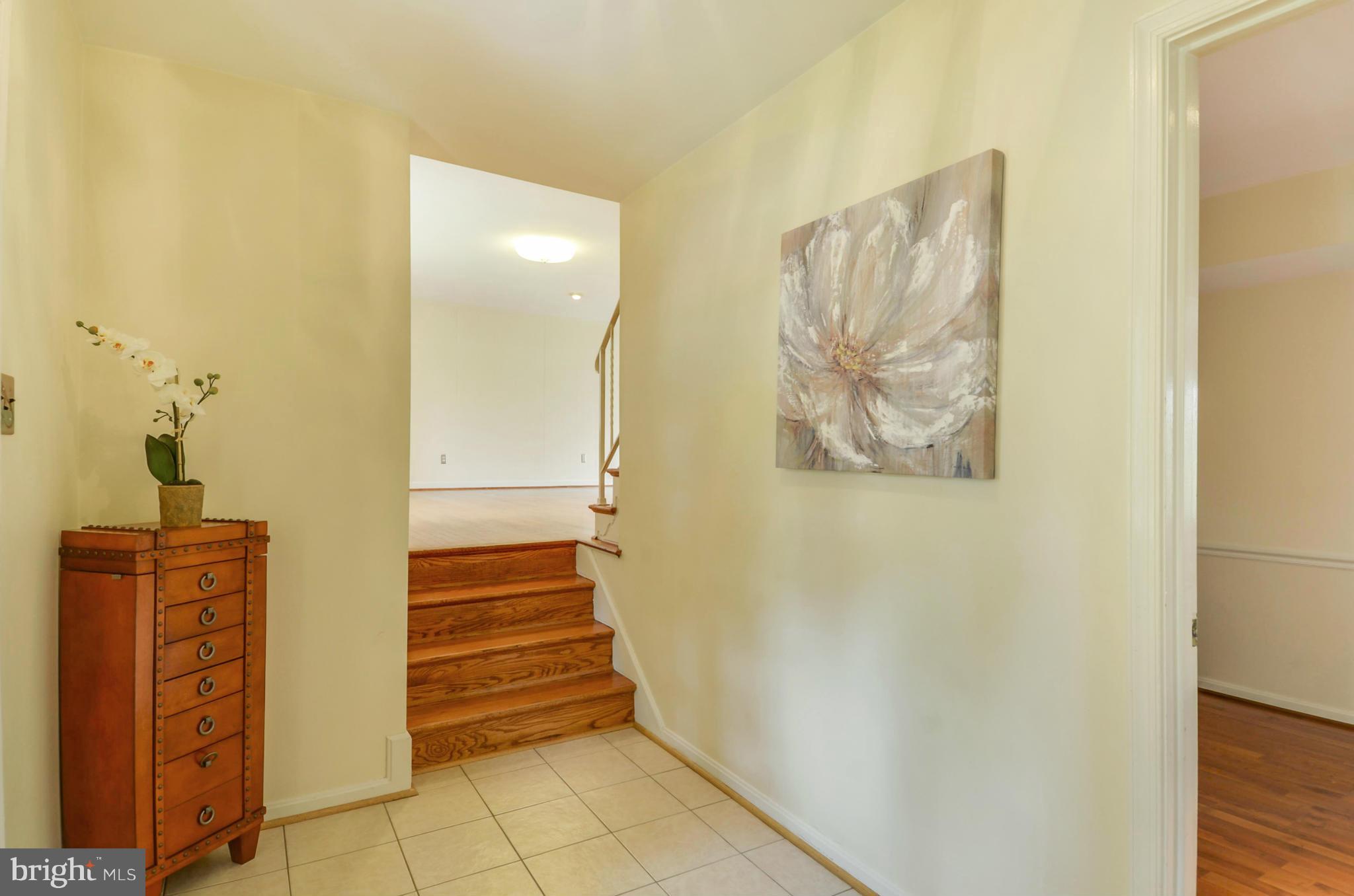 1395 Kimblewick Road Potomac, MD 20854 - Photo 2 of 30 a view of entryway and hall with wooden floor