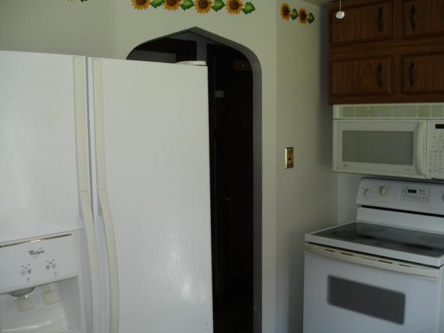 366 Streets Run Road Whitehall, PA 15236 - Photo 14 of 21 Kitchen. Electric stove with a glass cooktop and over the stove microwave oven. Whirlpool side by side refrigerator, all white appliances.