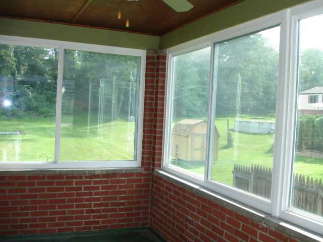 366 Streets Run Road Whitehall, PA 15236 - Photo 8 of 21 Sunroom. Charming sunroom has newer windows, a ceiling fan and the possibility of connecting to the HVAC system.