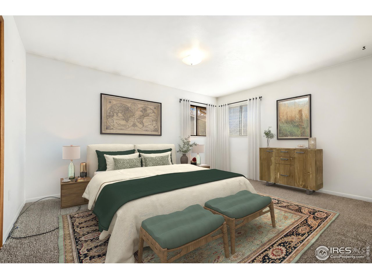 409 7th Street Windsor, CO 80550 - Photo 20 of 42 a bedroom with a bed a mirror on dresser and a dining table