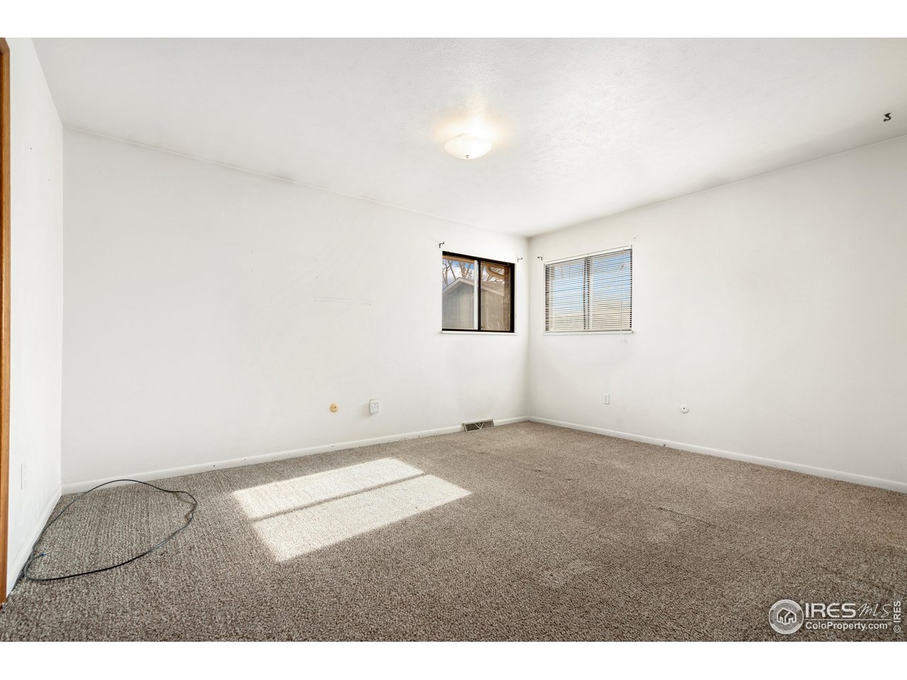 409 7th Street Windsor, CO 80550 - Photo 21 of 42 a view of an empty room