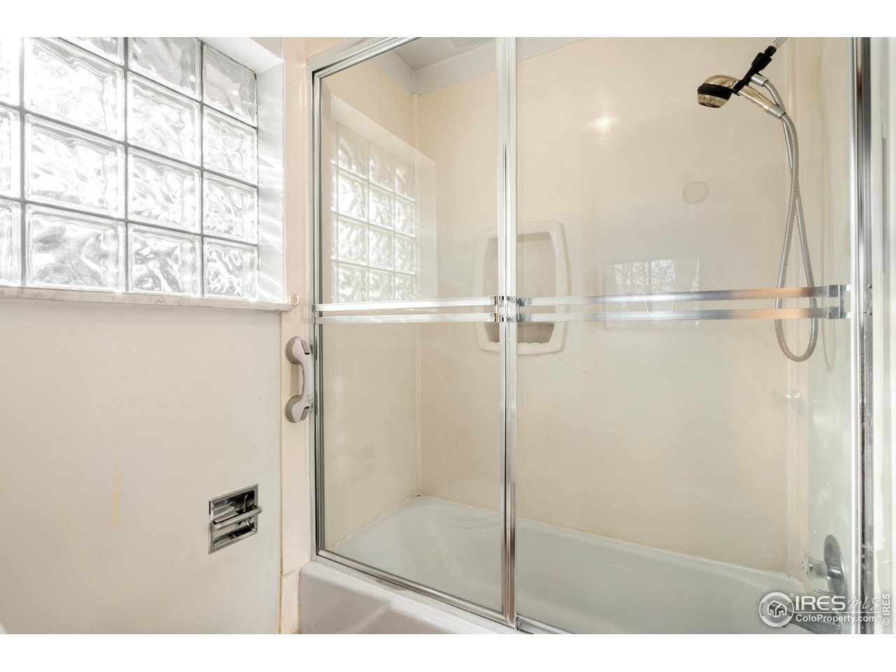 409 7th Street Windsor, CO 80550 - Photo 24 of 42 a bathroom with a shower