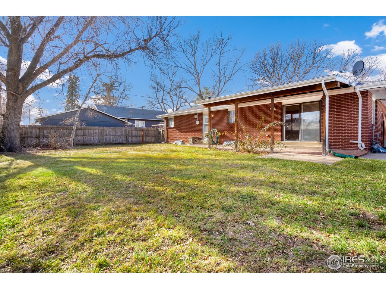 409 7th Street Windsor, CO 80550 - Photo 39 of 42 a view of a house with a yard