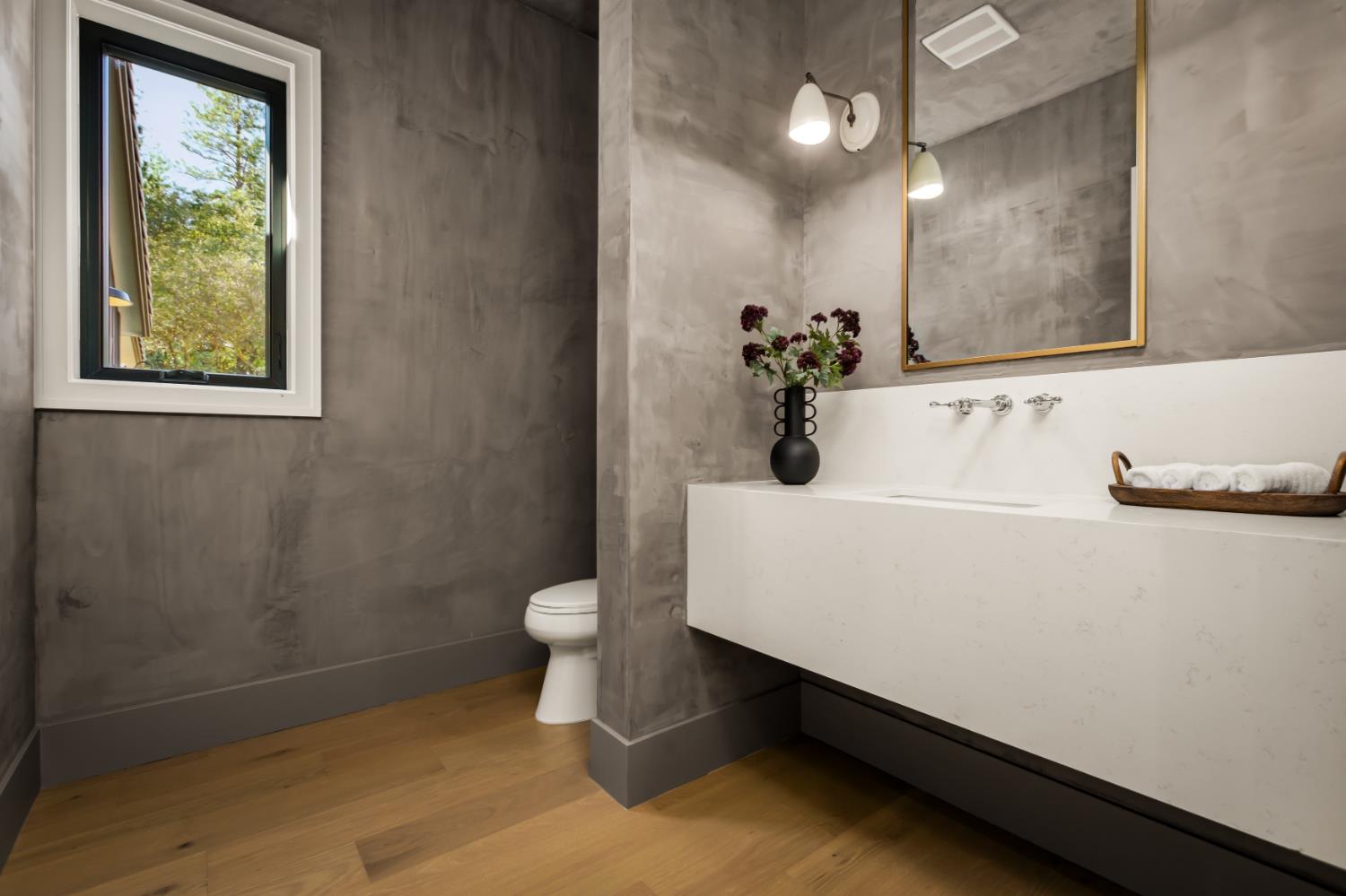 1632 The Point Meadow Vista, CA 95722 - Photo 26 of 61 Floating quartz vanity and Venetian plaster