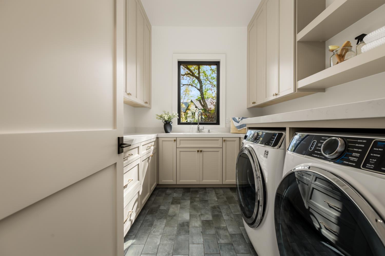 1632 The Point Meadow Vista, CA 95722 - Photo 40 of 55 Main level laundry, washer and dryer included