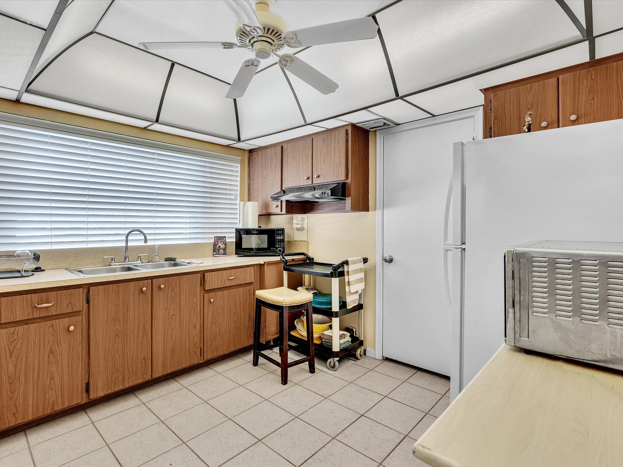 350 South Cypress Road, Unit 501 Pompano Beach, FL 33060 - Photo 43 of 48 Clubhouse Kitchen Area