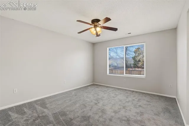 a view of an empty room with window