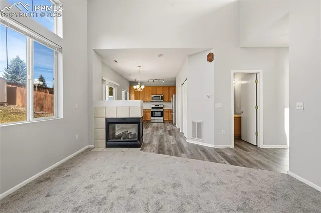 a view of a livingroom with a fireplace