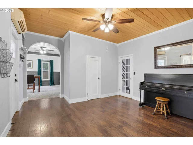 a view of kitchen with furniture and chandelier
