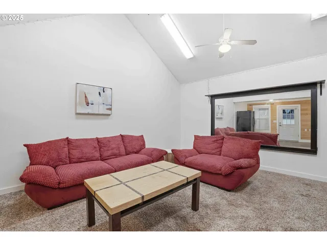 a view of a house with backyard