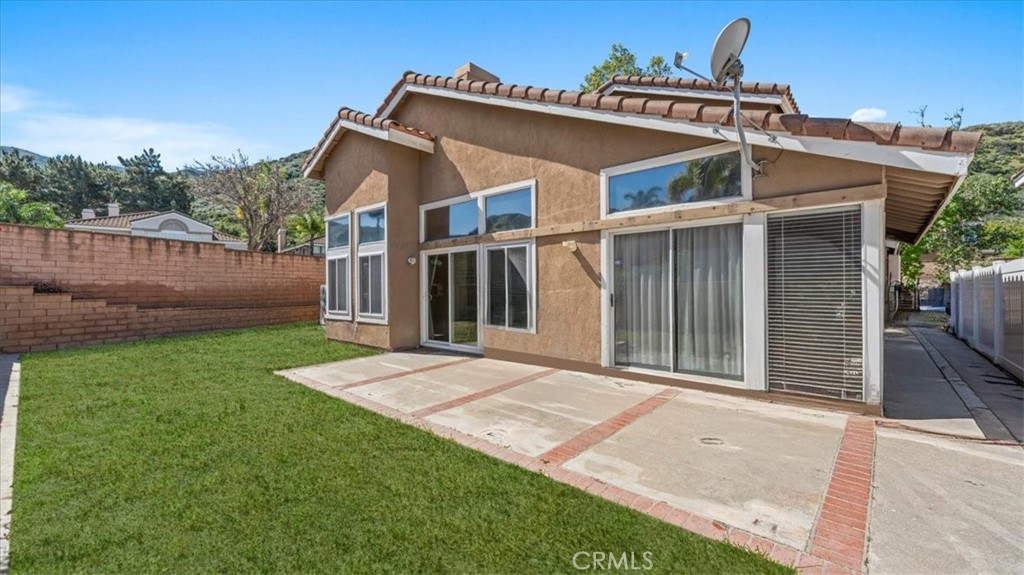 1671 Dominguez Ranch Road Corona, CA 92878 - Photo 29 of 42 a view of a house with a yard