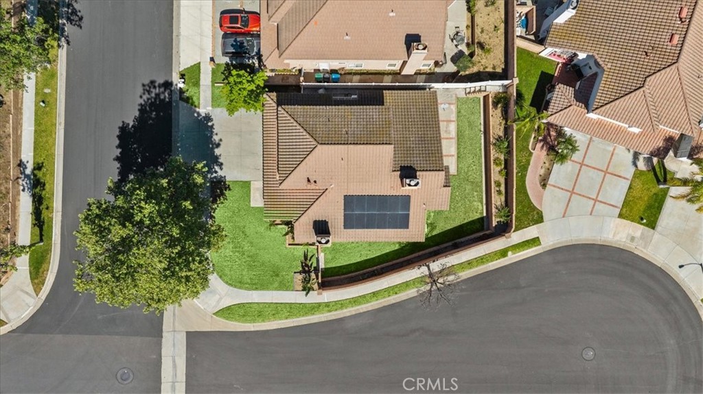 1671 Dominguez Ranch Road Corona, CA 92878 - Photo 35 of 42 an aerial view of a house with a yard and lake view