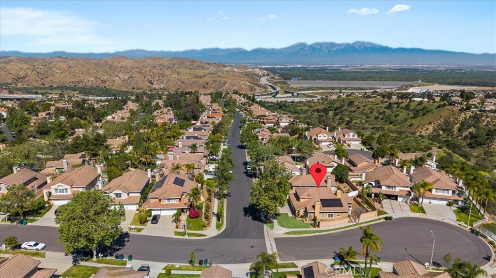 1671 Dominguez Ranch Road Corona, CA 92878 - Photo 37 of 42 an aerial view of residential house with outdoor space and mountain view