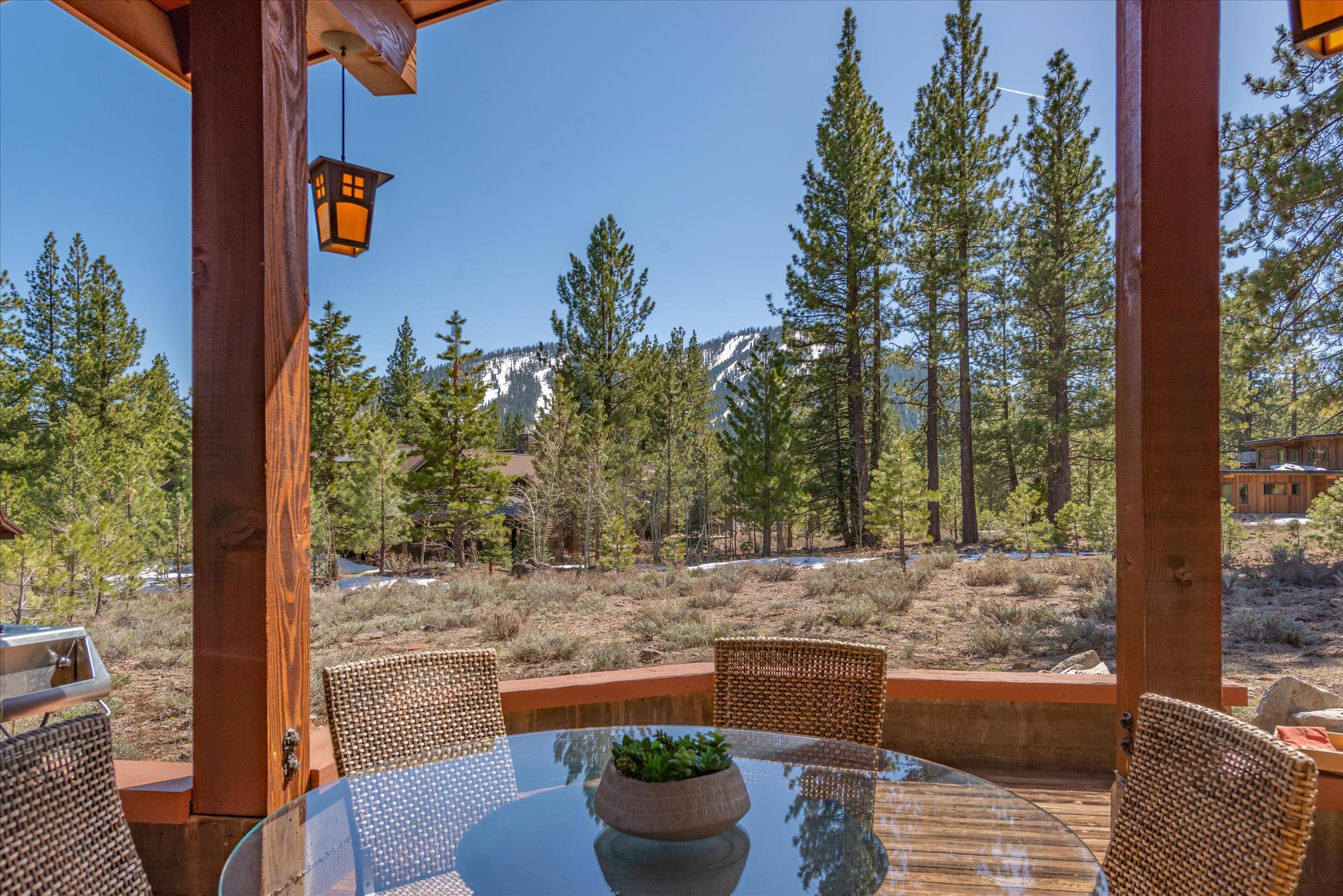 12416 Tom Dolley Truckee, CA 96161 - Photo 13 of 21 a view of a balcony with chair and table
