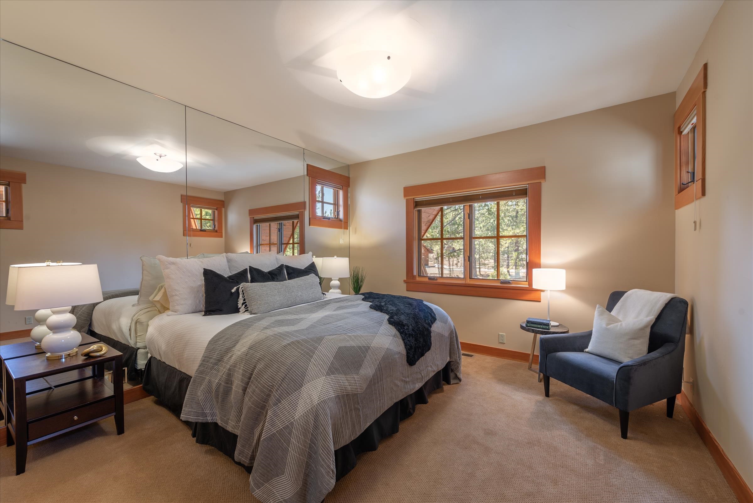 12416 Tom Dolley Truckee, CA 96161 - Photo 15 of 21 a spacious bedroom with a bed and window