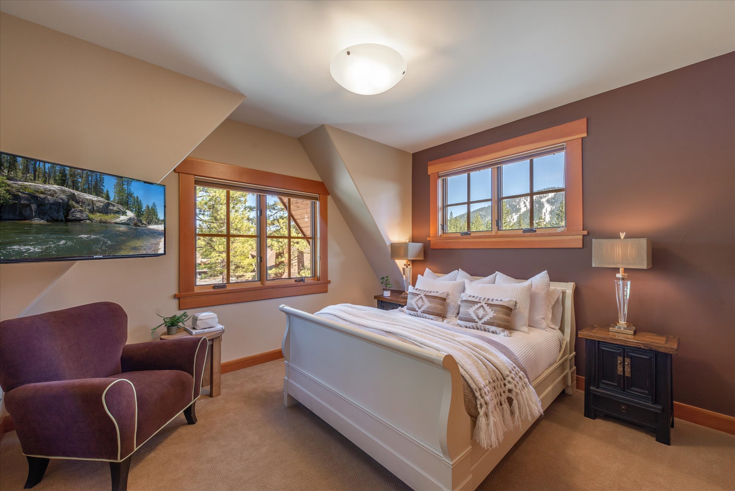 12416 Tom Dolley Truckee, CA 96161 - Photo 17 of 21 a bedroom with bed couch and window